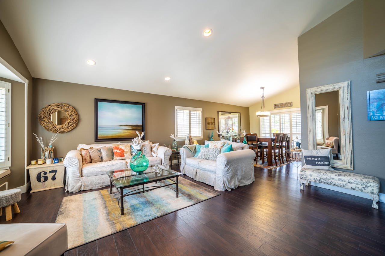 Services Elegant living room with stylish furniture and modern decor, perfect for home design inspiration.